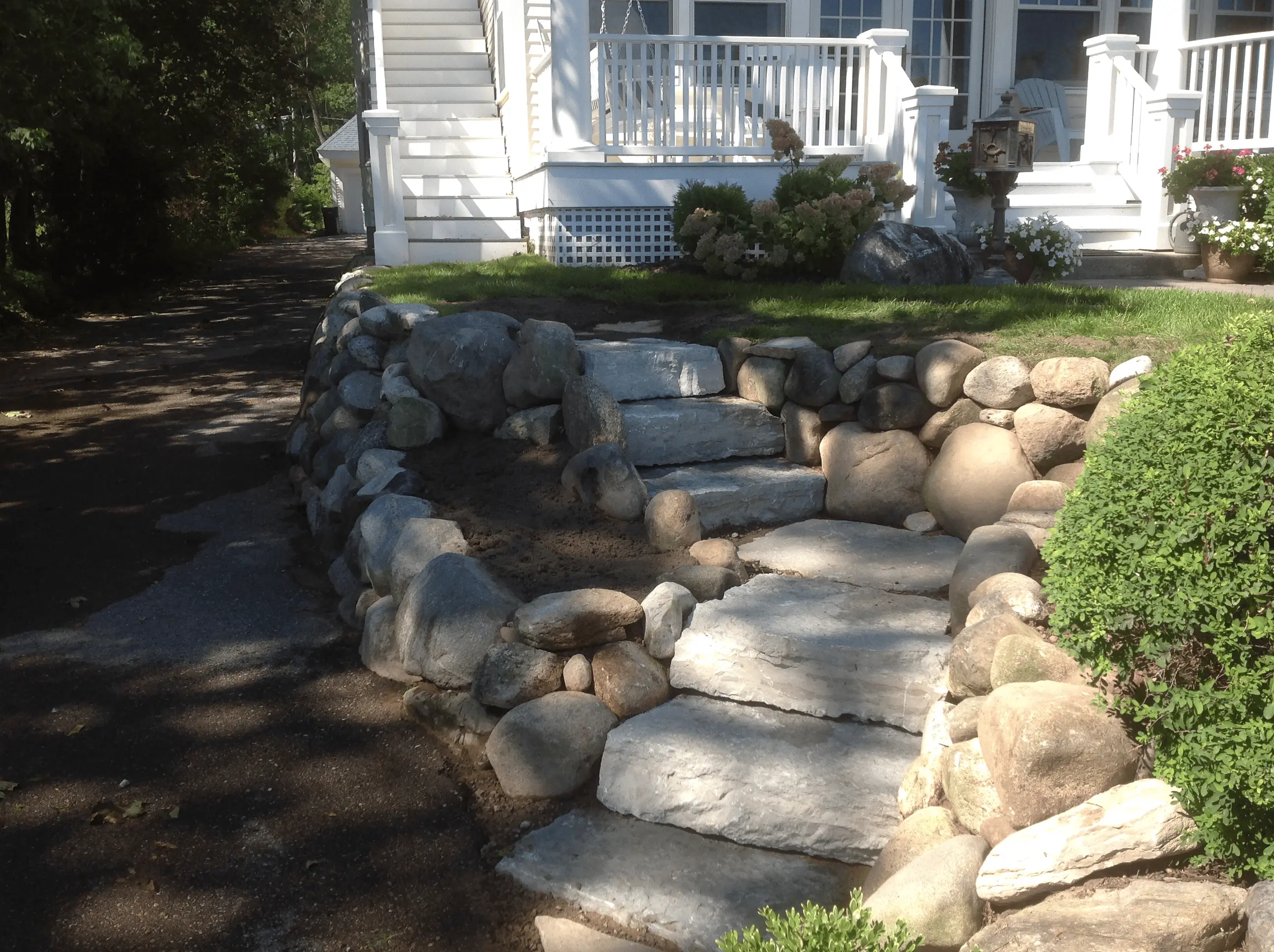 After: new stone steps installed into the slope.